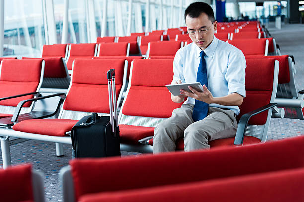 istock businessman at departure lounge 489042832