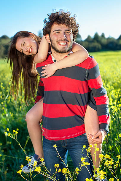 istock Happy handsome young man with curly hair. 489043451