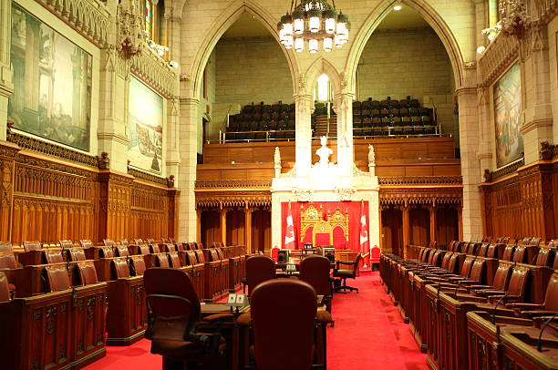 The Senate of Canada - Red chamber Red Senate Chamber of the Canadian Parliament - Parliament Hill, Ottawa, Canada. See more in my portfolio. senator photos stock pictures, royalty-free photos & images