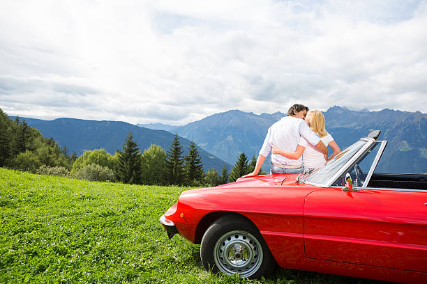 istock Young couple relaxing on a cabriolet 489045319
