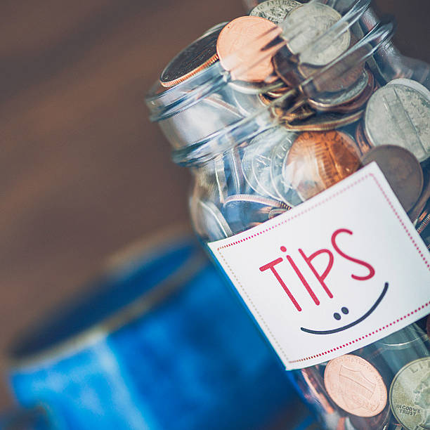 こて先の瓶のコーヒーショップやレストランがございます。米国通貨 - tip jar finance thank you ストックフォトと画像