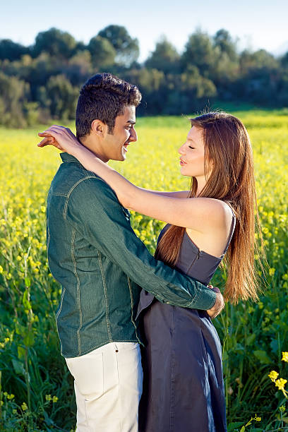 Affectionate young couple in a loving embrace.