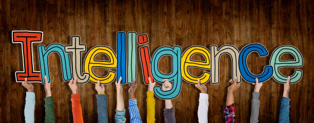 istock Group of Hands Holding Intelligence Word Concept 489076600