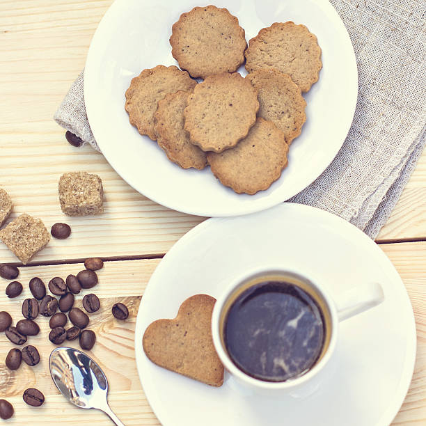 istock Ginger biscuits, cinnamon, a cup of hot coffee. 489078722