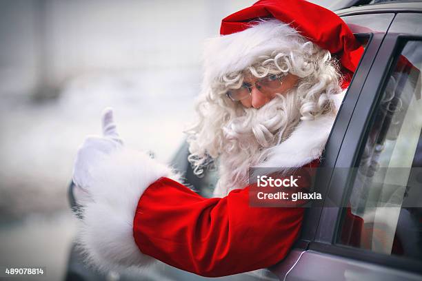 Driving Santa Stock Photo - Download Image Now - Santa Claus, Car, Christmas
