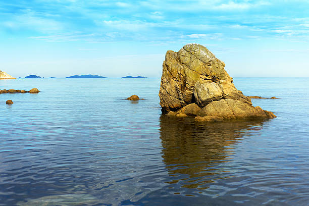 istock Beautiful seascape with rocks and cloudy sky. 489080402