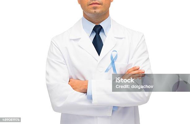 Doctor With Prostate Cancer Awareness Ribbon Stock Photo - Download Image Now - Doctor, Prostate Cancer, Cancer - Illness