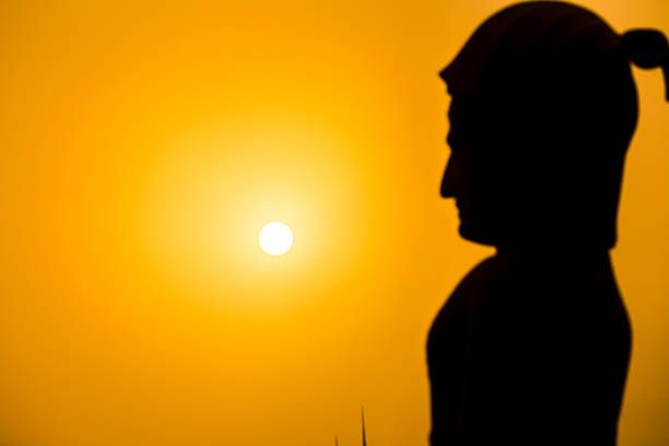 istock Buddha silhouette with the sun at sunset. 489082714