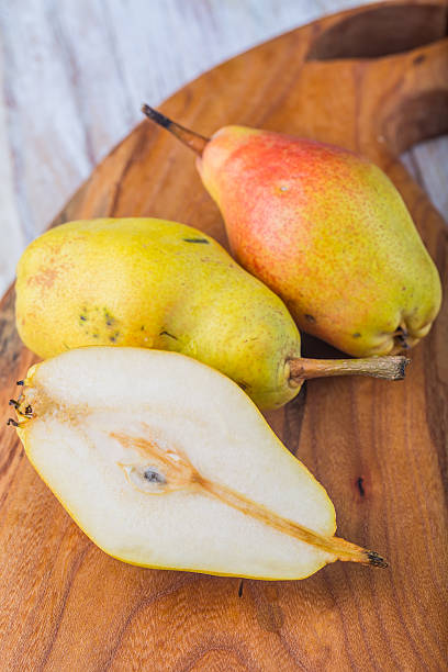 istock Ripe tasty pears on table 489083150