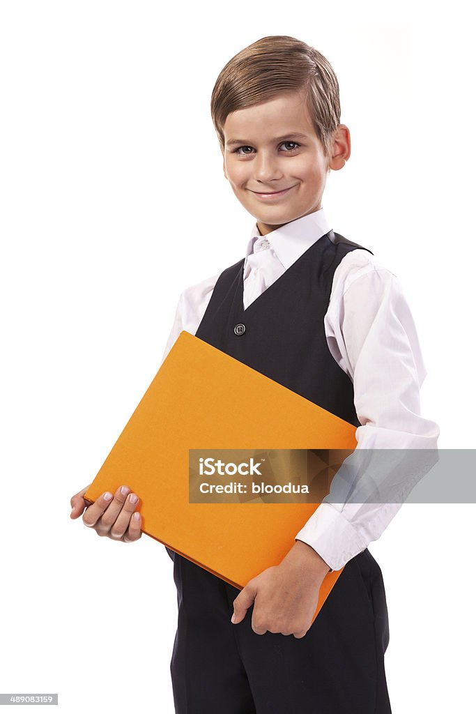 School boy is holding a book School boy is holding a book isolated on white background Back to School Stock Photo