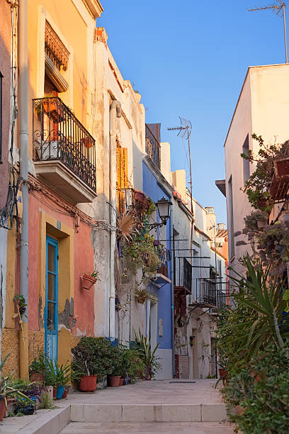 istock Old street with multicolored houses 489083369
