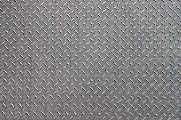 Metal Pattern A diagonal pattern on gray metal metal grate stock pictures, royalty-free photos & images