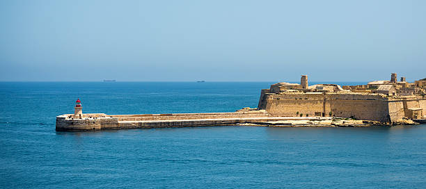 istock lighthouse of Valletta port 489086064