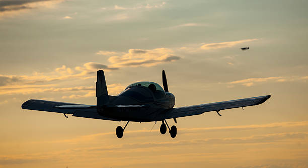 Woman and man flying at sunset Woman and man at airplane at sky flying in sunset flight instruments stock pictures, royalty-free photos & images