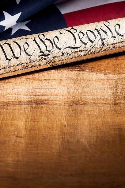 istock U.S. Constitution and American Flag with Copyspace 489086617