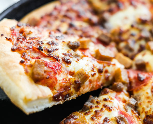 istock piece of delicious pizza 489087414