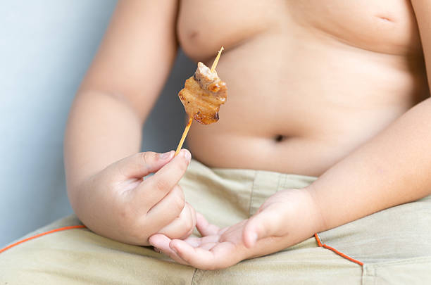 istock grilled pork on fat boy hand 489087468