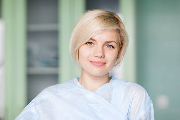 istock woman smile in operating surgery room 489087649