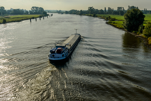 Cargo ship on the IJssel river in The Netherlands