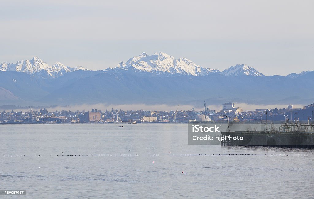 Everett and the Cascades This image shows the port of Everett with the Cascade Mountain Range behind. Everett - Washington State Stock Photo