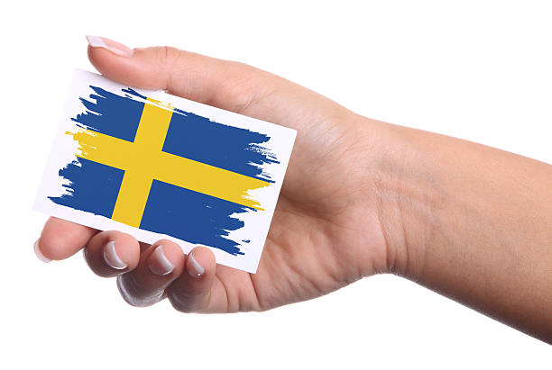 istock Hand holding a business card.Sweden Flag. 489088159