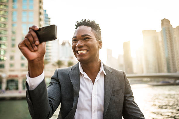 istock Successful business man against the skyscraper 489089666