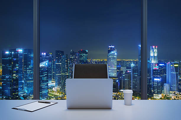 istock workplace in  panoramic office with New York evening view. 489110144