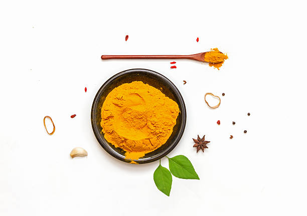 istock The turmeric powder and spices on white background. 489110156