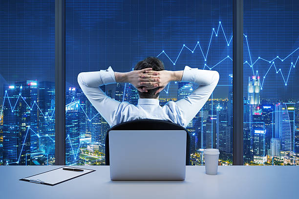 istock businessman who is looking at the city 489111178