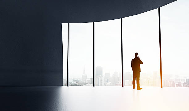 istock businessman with cell phone 489113144