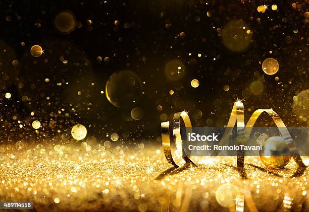 Golden Streamers With Sparkling Glitter Stock Photo - Download Image Now - Backgrounds, Gold - Metal, Confetti