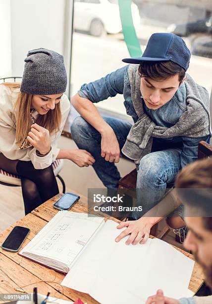 Above View Of Young Architects Working On A New Project Stock Photo - Download Image Now