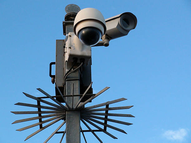 istock Scene Of CCTV Road Security Camera Against Blue Sky 489115582