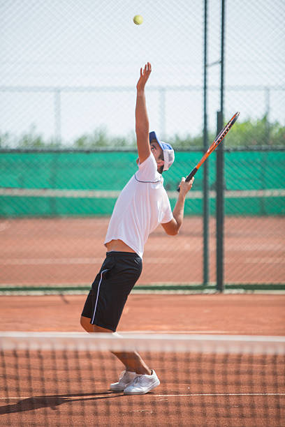 istock Young man playing tennis 489115946