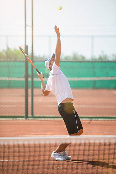 istock Young man playing tennis 489116146