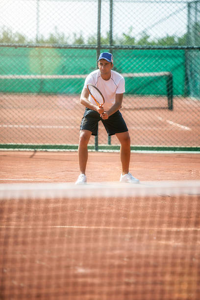 istock Young man playing tennis 489116754