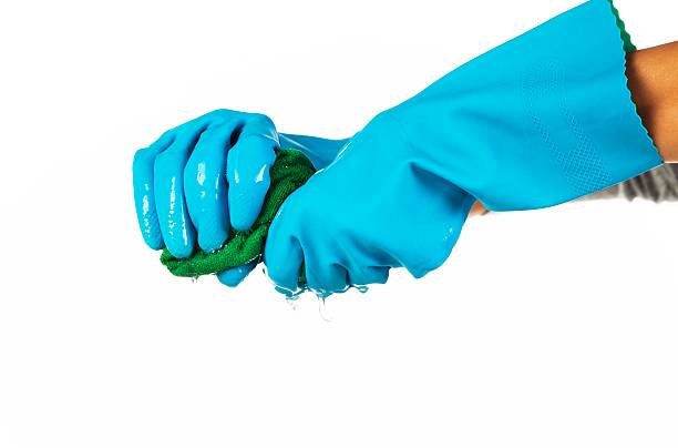 blauer gummi-handschuhe auf weißem hintergrund - nonconductor stock-fotos und bilder