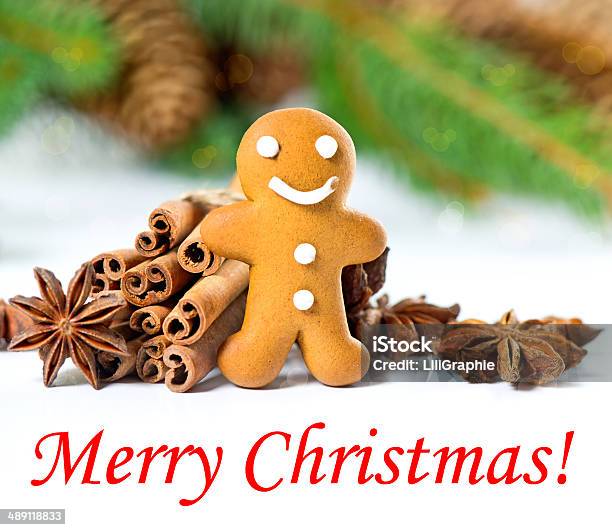 Smiling Gingerbread Man With Christmas Spices Stock Photo - Download Image Now - Anise, Backgrounds, Baked