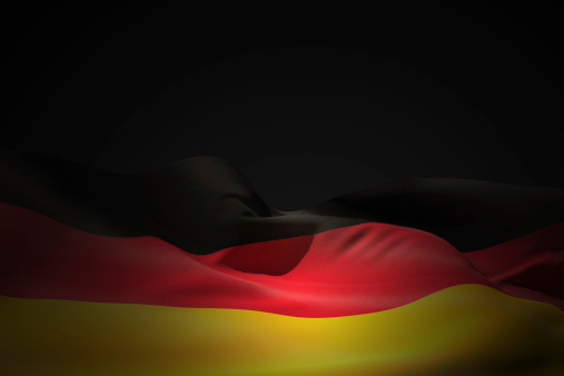 Germany flag waving against black shadow