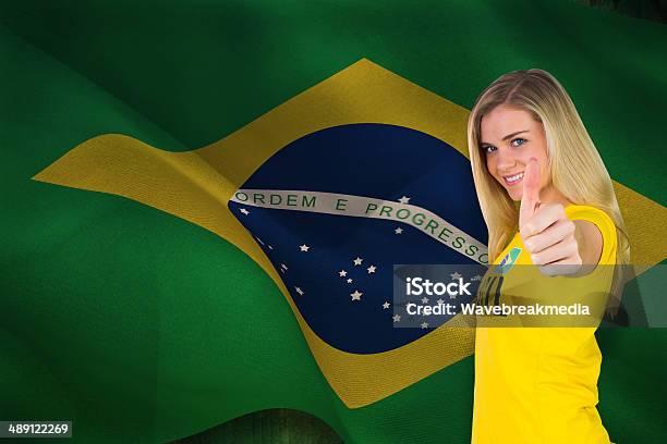 Pretty Football Fan In Brasil Tshirt Stock Photo - Download Image Now - 18-19 Years, Adult, Beautiful People