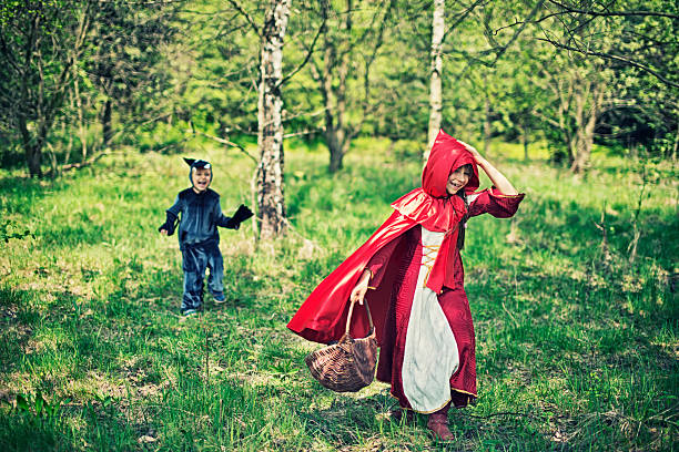 istock Little Red Riding Hood running from the wolf 489123363