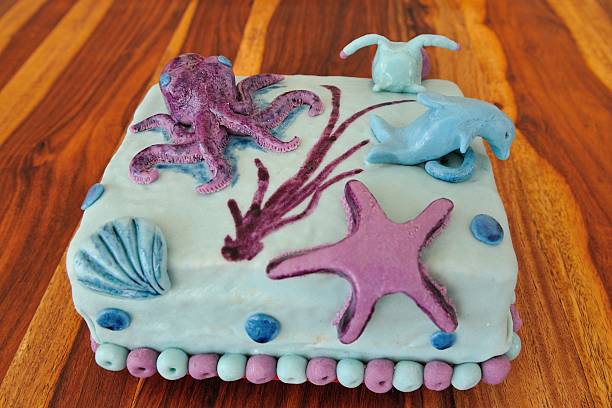 istock Beautiful birthday cake in submarine decoration 489124049