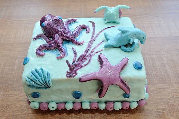 istock Beautiful birthday cake in submarine decoration 489124055