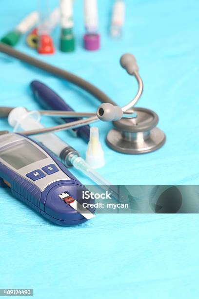 Diabetic Is Doing A Glucose Level Finger Blood Test Stock Photo - Download Image Now