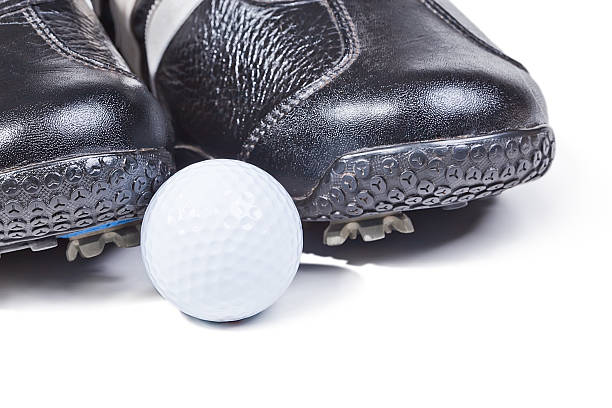 istock Golf balls and golf shoes 489124939