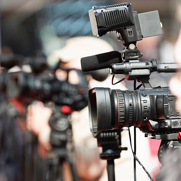 istock TV cameras on press conference 489125329