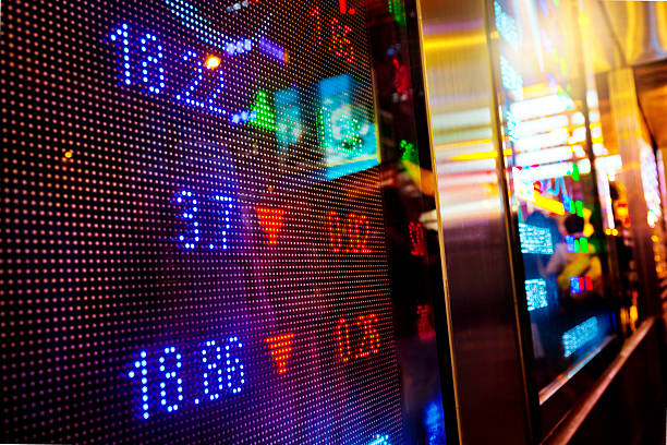 istock display stock market numbers and graph 489125421