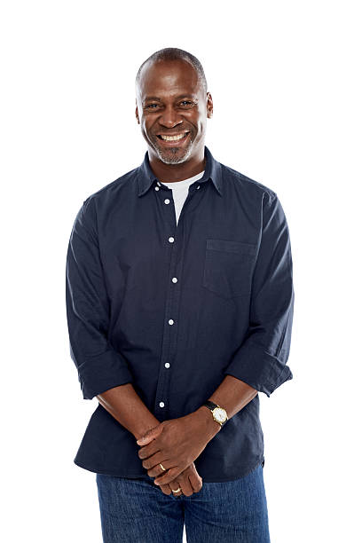 istock Cheerful mature afro american man standing relaxed on white 489125473