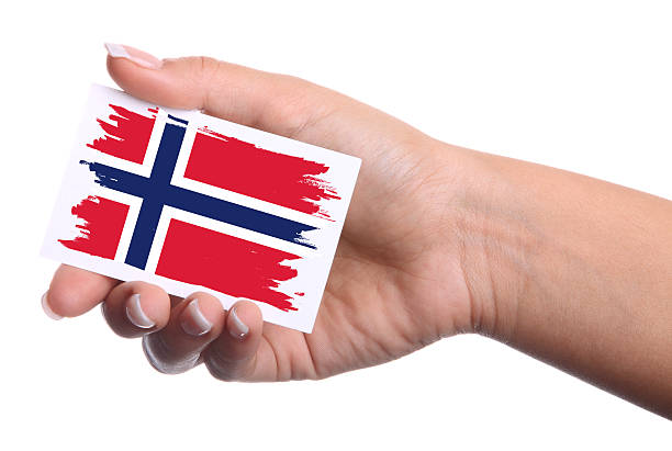 istock Hand holding a business card.Norway Flag. 489125599