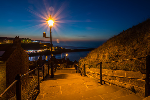 The famous 199 Steps at Whitby leading from the town up to the Abbey and church at night